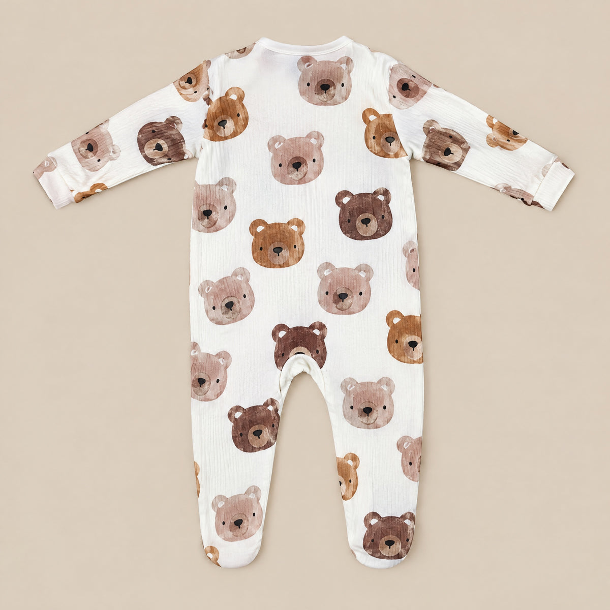 Cream watercolour bear footed sleepsuit, back, laid flat