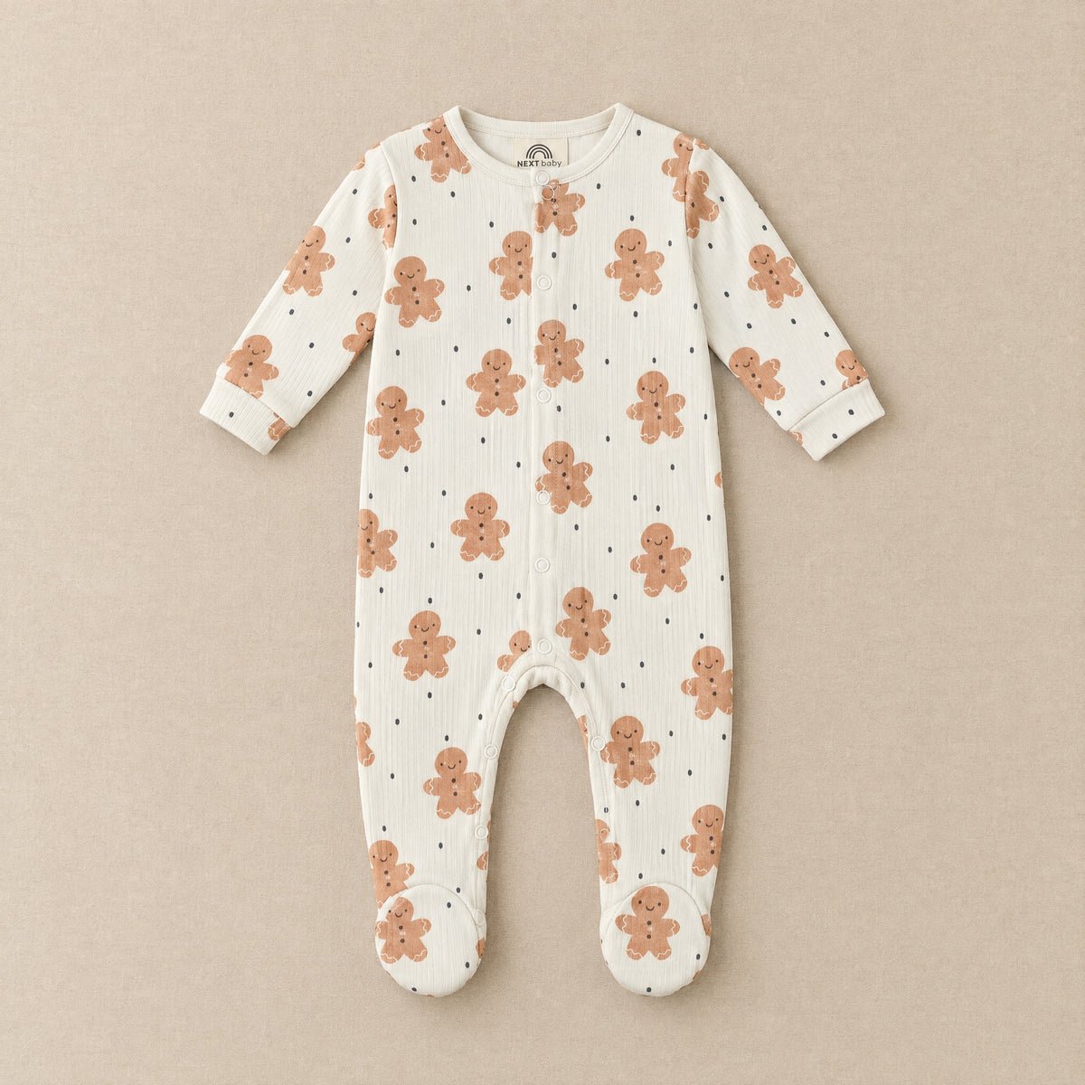 Cream gingerbread footed sleepsuit, front, laid flat