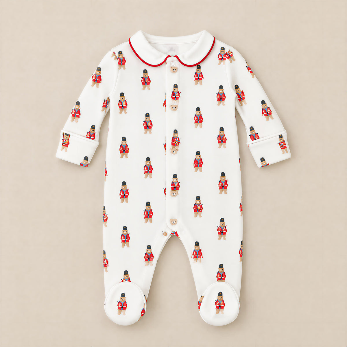 Ivory guard bear footed sleepsuit, front, laid flat