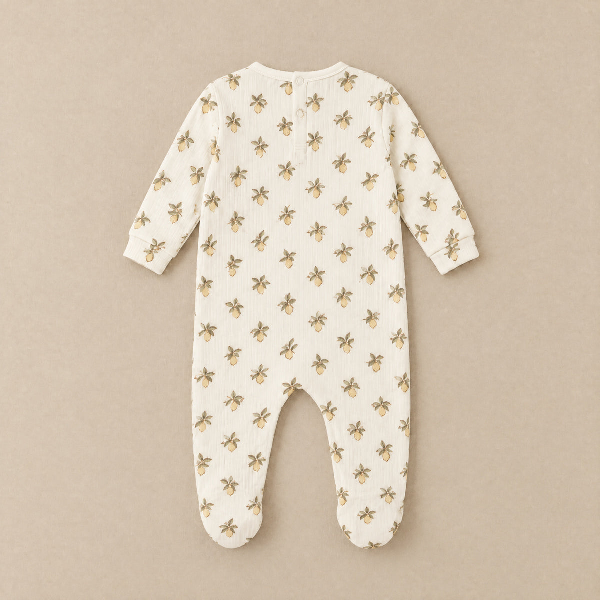 Ivory lemon print footed sleepsuit, back, laid flat