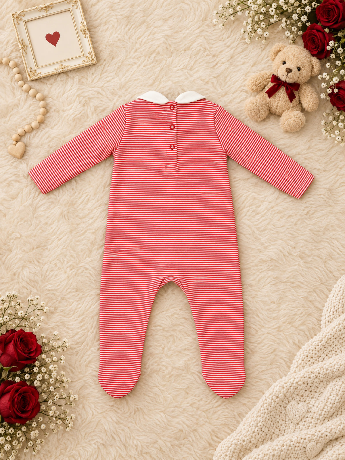 Red-stripe footed sleepsuit, back, laid flat