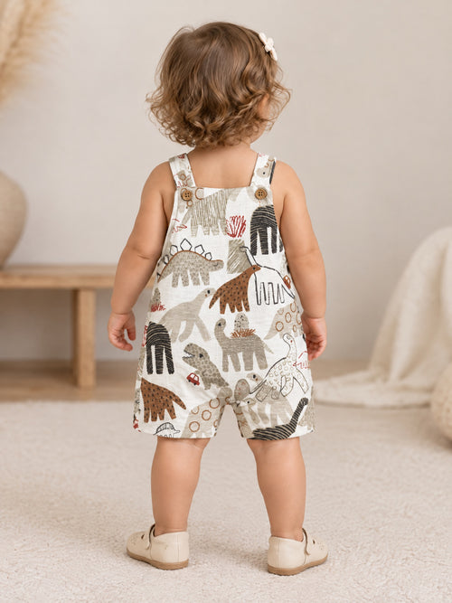 Toddler in the Dino Parade dungarees, back