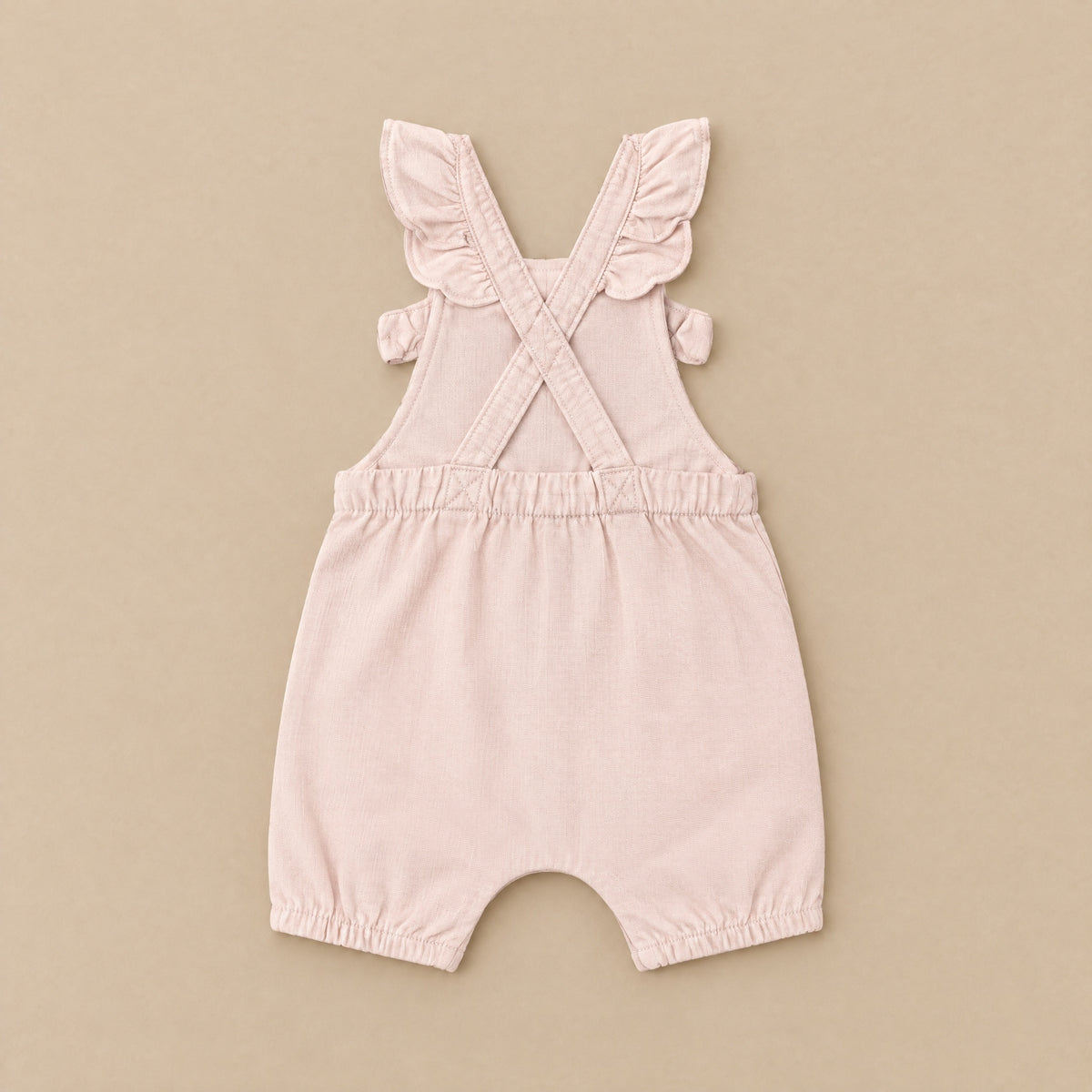 Little Fawn dungarees laid flat, back