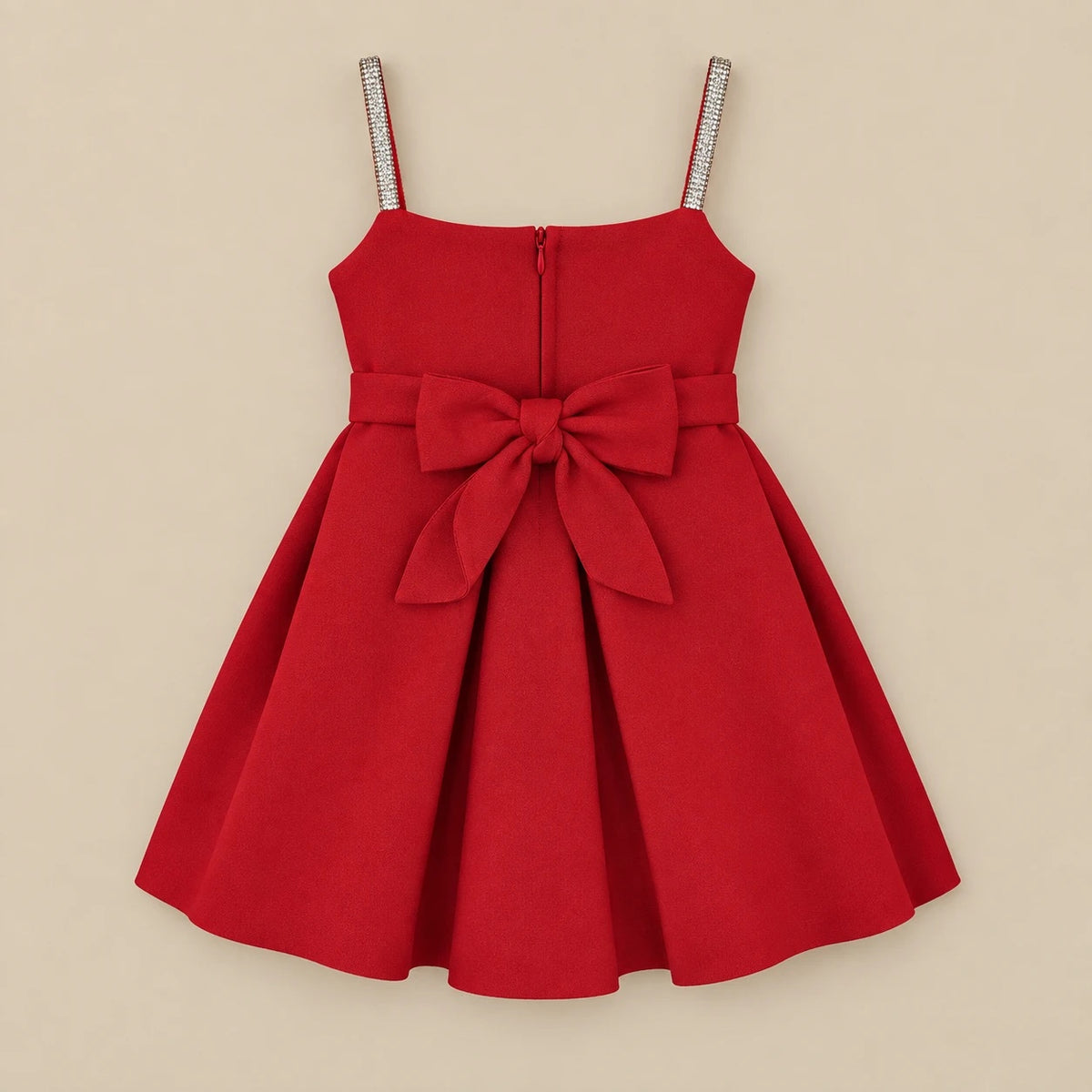 Back of the red party dress showing the zip and tie-bow sash