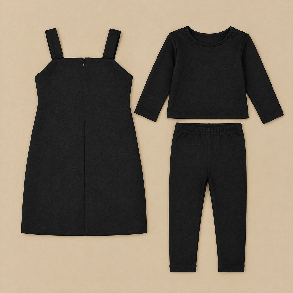 Back of the pinafore with zip, beside the top and leggings