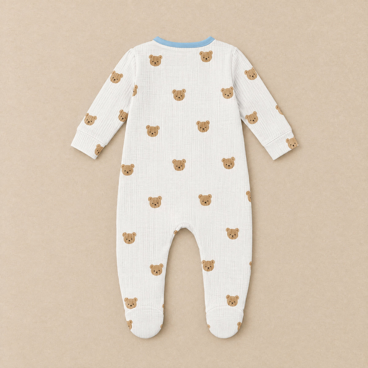 Cream teddy face footed sleepsuit, back, laid flat