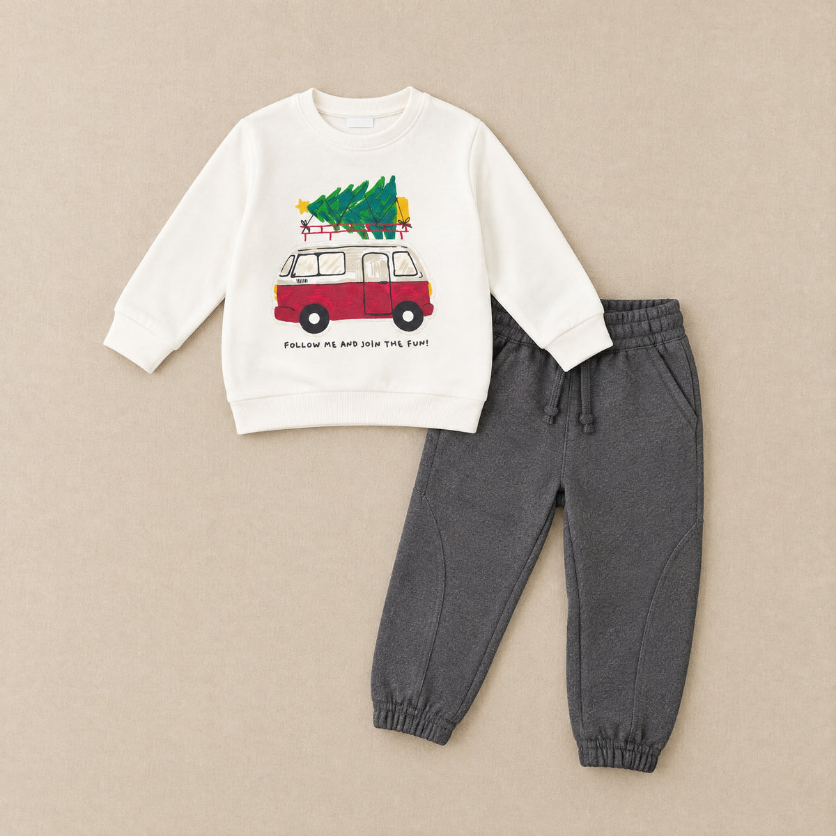 Ivory van sweatshirt and charcoal joggers laid flat, front